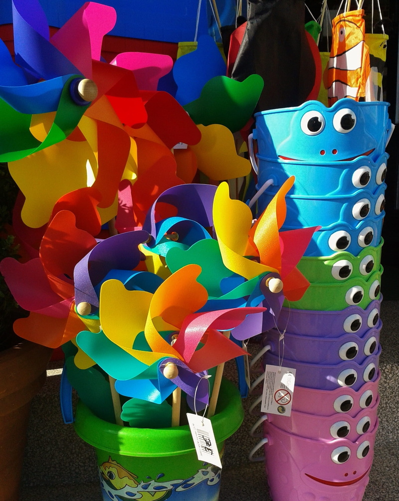 children toys, holidays, colorful, close-up, day, 1080P, plastic, abundance, toys, bucket, hanging, pinwheel, eyes, bright, retail, balloon, large group of objects