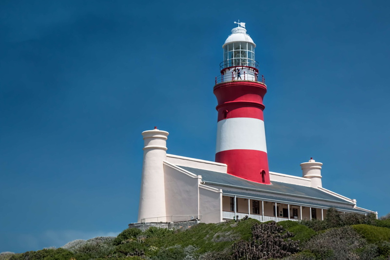 coastline, built structure, day, sea, indian ocean, safety, guidance, red, outdoors, architecture, coast, building exterior, low angle view, nature, atlantic ocean