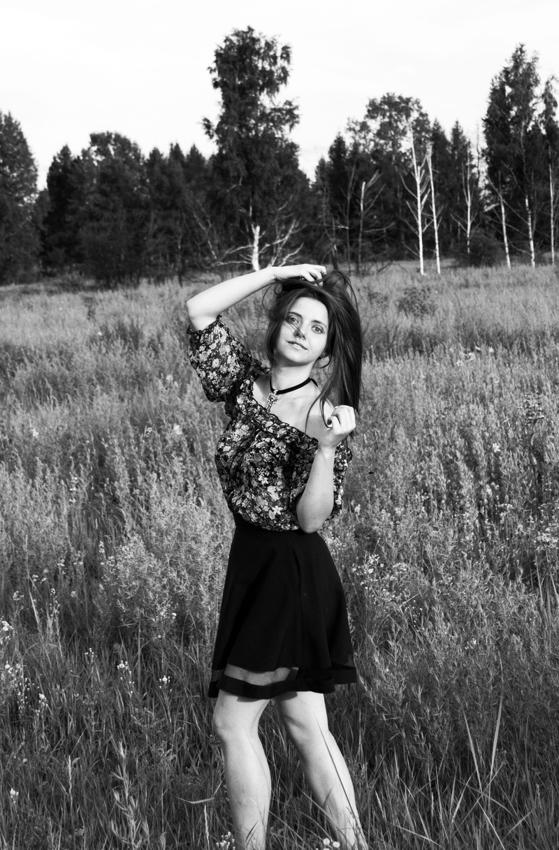 real people, happiness, portrait of a girl, casual clothing, joy, portrait, only women, land, sun, model, story, field, leisure activity, Black-And-White