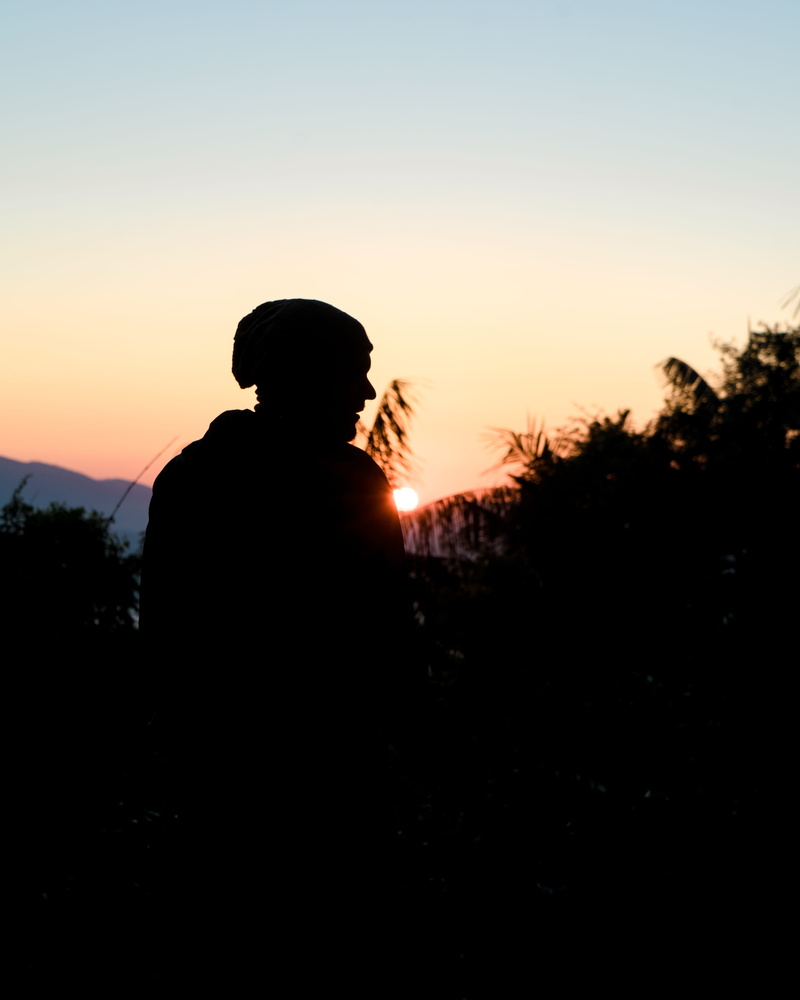 sunset, standing, one person, sky, lifestyles, nature, black, looking at view, blue, forest, outdoors, outdoor, sunrise, morning, early, orange color, boy