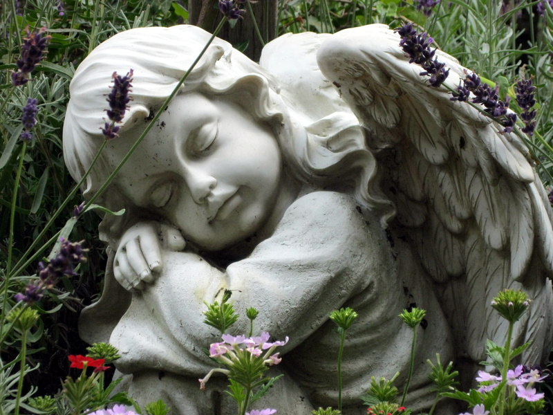 art and craft, spirituality, day, flowering plant, outdoors, close-up, mourning, nature, no people, craft, memorial, angel figure, female likeness, sculpture
