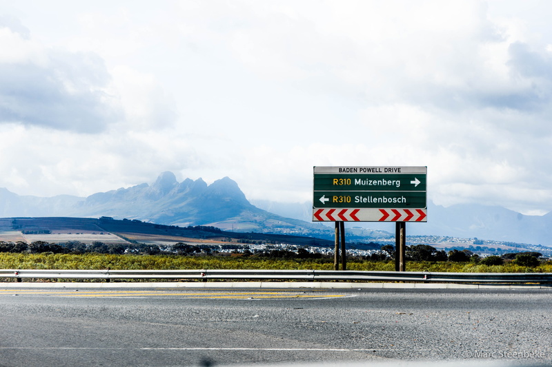 communication, southafrica, road marking, outdoors, trees, 5K, crash barrier, information, western script, mountains, road, cape town, cloud - sky, roadsign