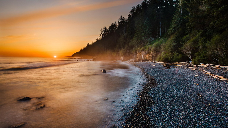steam, land, hot spring, power in nature, orange color, scenics - nature, beside, idyllic, sea, trees, tranquil scene, sunset, landscape, non-urban scene