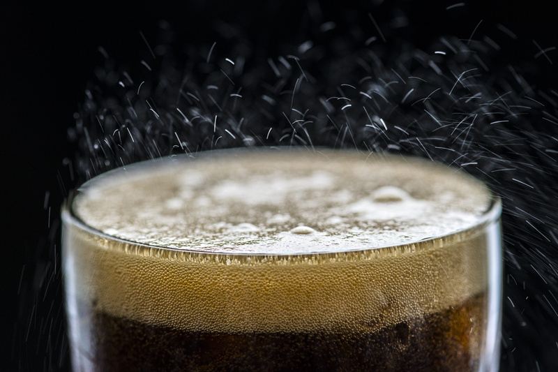 cola, soda, black background, pop, food and drink, single object, beer, thirsty, refreshment, soft drink, drink, close up, beer glass, ice, household equipment