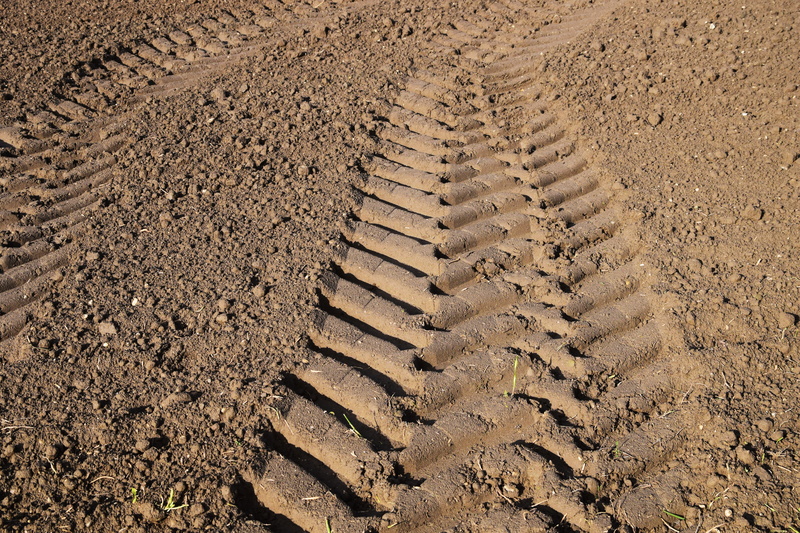 no people, arable, earth, land, brown, pattern, nature, outdoors, beauty in nature, in the wake, backgrounds, direction, clay soil, arid climate, ground