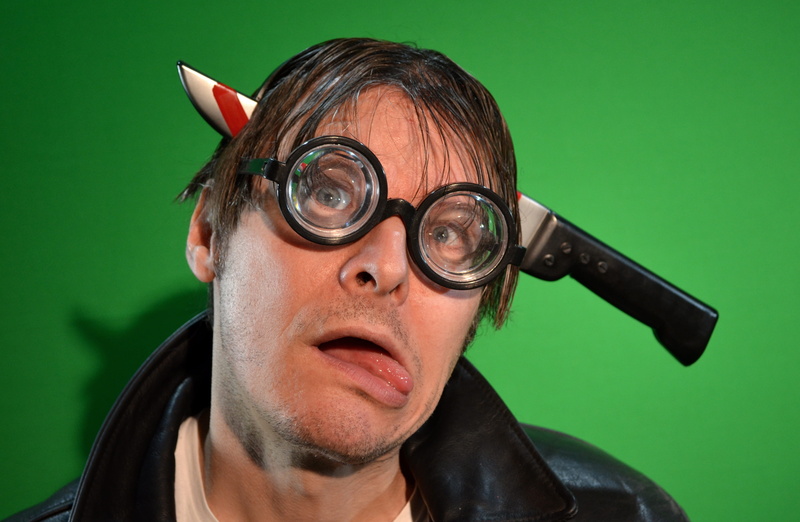 comedy, human face, portrait, fear, existential angst, dead, green color, head, funny, excitement, studio shot, undead, humor, colored background, close-up