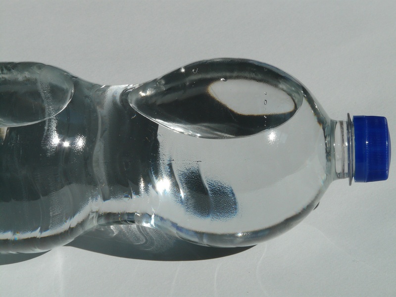 bottle, bubble, still, single object, household equipment, horizontal, screw cap, still life, filled, concerns, capping, water, lid, blue, reflection, pet