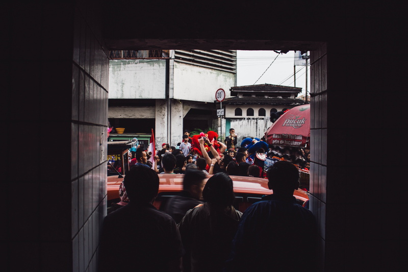 real people, built structure, street, city, rear view, crowd, day, lifestyles, spectator, bandung, leisure activity, people, adult, indonesia, culture