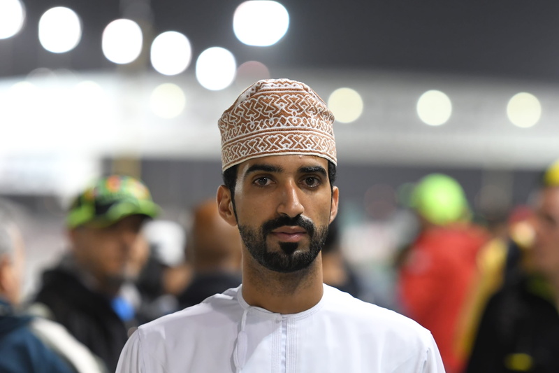 clothing, business, uniform, men, beard, front view, confidence, looking at camera, visitor, mid adult, focus on foreground, headshot, motogp, incidental people