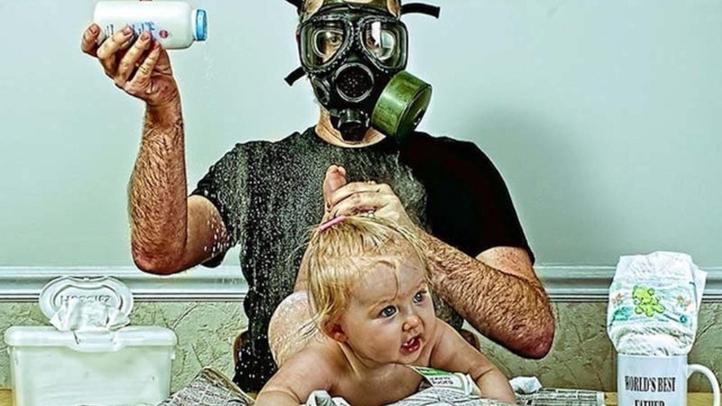 indoors, people, fun, waist up, draw, water, smelly, gas mask, drawing, disguise, adult, portrait, smell, mask - disguise, humor, lifestyles, bizarre, mask