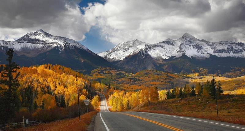 sign, dry grass, autumn, fall, beauty in nature, cloud - sky, mountains, snowcapped mountain, scenics - nature, landscape, direction, dividing line, road marking