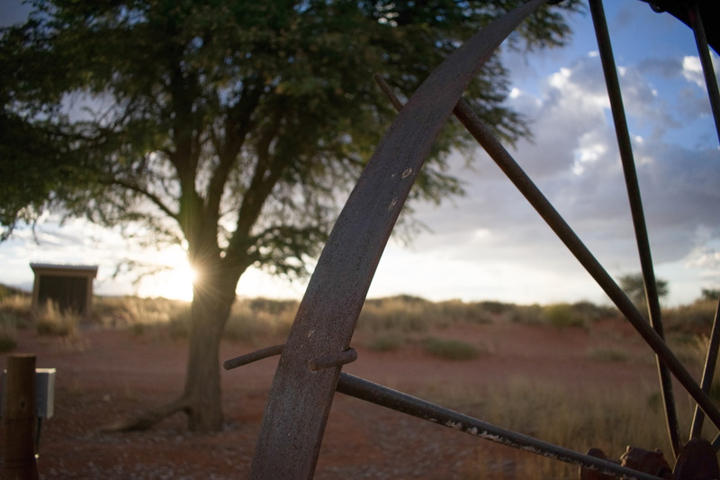 sky, sunset, abandoned, cloud - sky, field, desert, farm equipment, no people, tranquility, outdoors, kalahari, fence, plant, land, tranquil scene, barrier