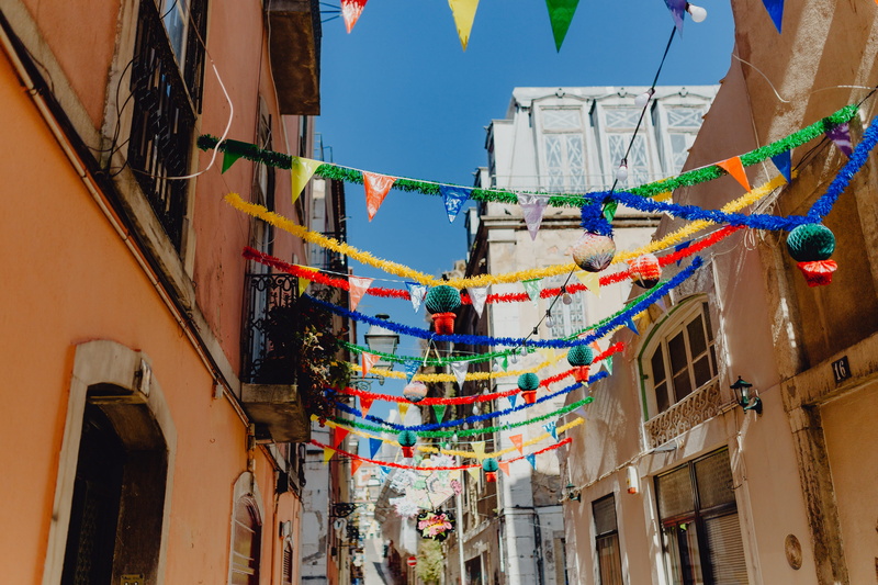 santo antonio, decorated, architecture, building exterior, sunlight, bunting, garland, building, outdoors, streets, decoration, anthony, residential district