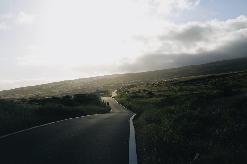 unitedstate, cloud - sky, environment, way, direction, tranquil scene, gravel, no people, mountain road, outdoors, empty, sign, road, asphalt, plant, scenics - nature