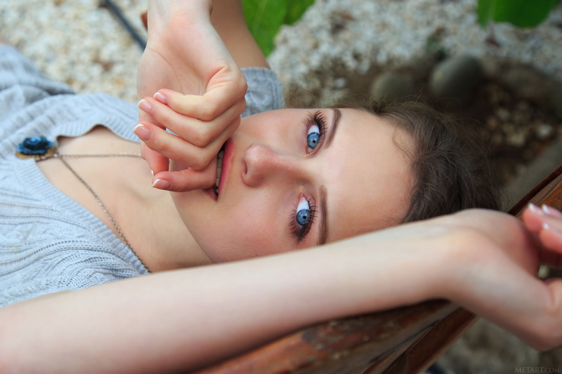 finger in mouth, lying down, women outdoors, face, juicy lips, top view, MetArt Magazine, women, Clarice A, necklace, model, blue eyes, bokeh, looking at viewer