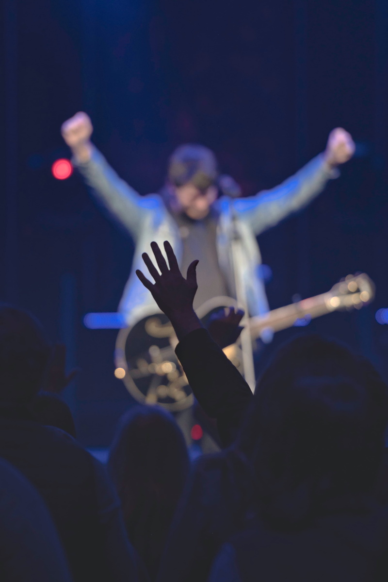 live event, rock concert, real people, person, enjoyment, stage light, hands, 4K, excitement, lifestyles, leisure activities, arms raised, leisure activity