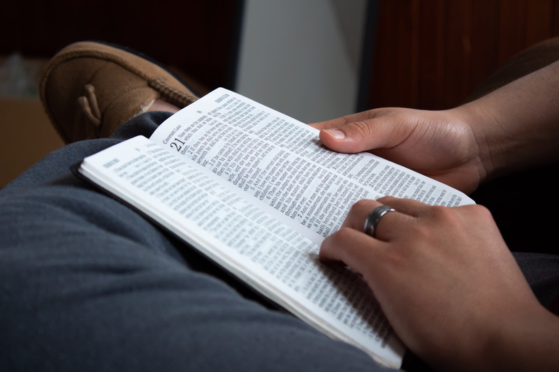 close-up, paper, reading, body part, text, praise, electronics, computer hardware, christian, midsection, one person, leisure activity, hand, adult, bible