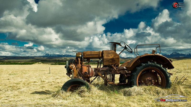 plant, field, environment, machinery, land vehicle, nature, cloud - sky, trigo, mode of transportation, no people, transportation, sky, rural scene, campo