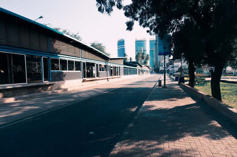 no people, tree, sunlight, architecture, footpath, building, shadow, 4K, built structure, transportation, plant, tone, tanzania, direction, day, long