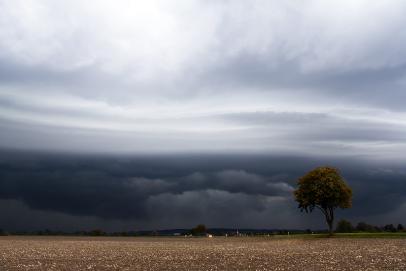 cloudscape, dramatic sky, cloud - sky, squall line, field, storm, tranquility, no people, outdoors, plant, atmosphere, dark clouds, gust front, cloud front