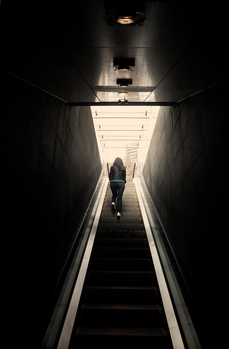 walking, tunnel, disappear, real people, urban, diminishing perspective, built structure, steps and staircases, stairs, light, cold, street, light at the end of the tunnel