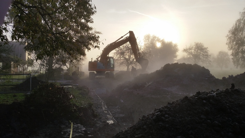 construction industry, sunlight, Channel, construction site, tree, plant, bulldozer, growth, land vehicle, machinery, agricultural machinery, transportation