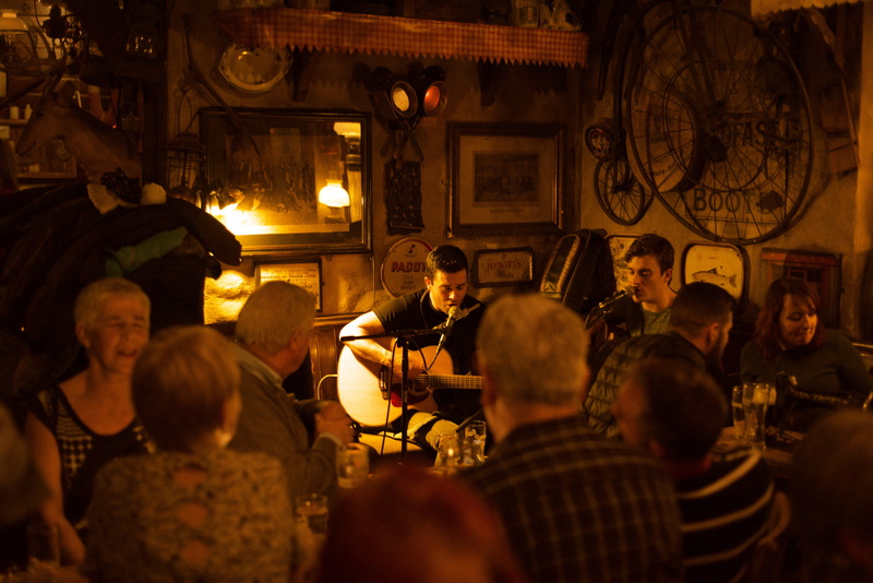 galway, mid adult men, indoors, 5K, night, group of people, adult, pub, females, women, real people, large group of people, folk music, sitting, men, mid adult