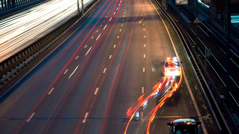 police, high angle view, blue, light trails, motor vehicle, no people, table, red, 1080P, on the move, architecture, long exposure, light trail, land vehicle