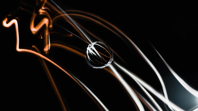 white, longexposure, reflection, music, studio shot, light, black color, no people, focus on foreground, 4K, extreme close-up, indoors, blakc, black background