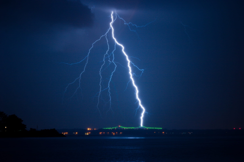lightning, warning sign, struck, 2K, communication, outdoors, illuminated, sign, city, water, power in nature, time, aggression, cloud - sky, sea, power