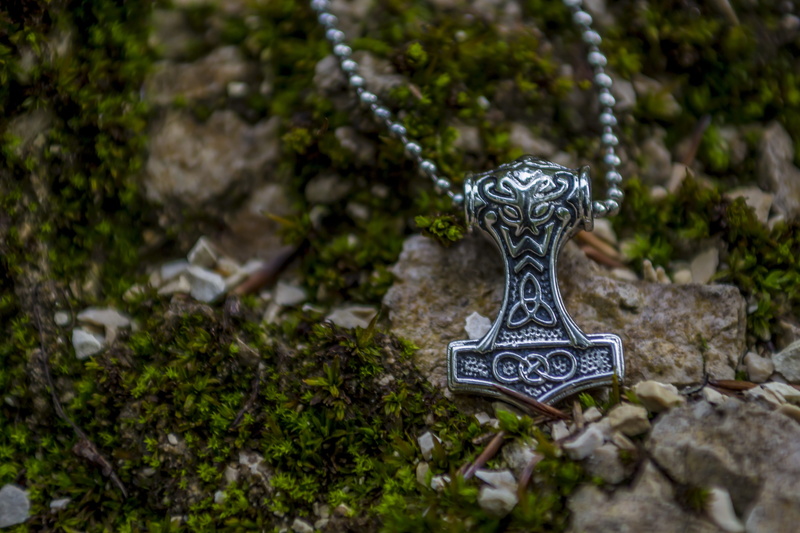 viking jewelry, characters, cross, day, belief, thor, viking, metal, spirituality, grave, tombstone, runes, power, no people, nordic, outdoors, cemetery