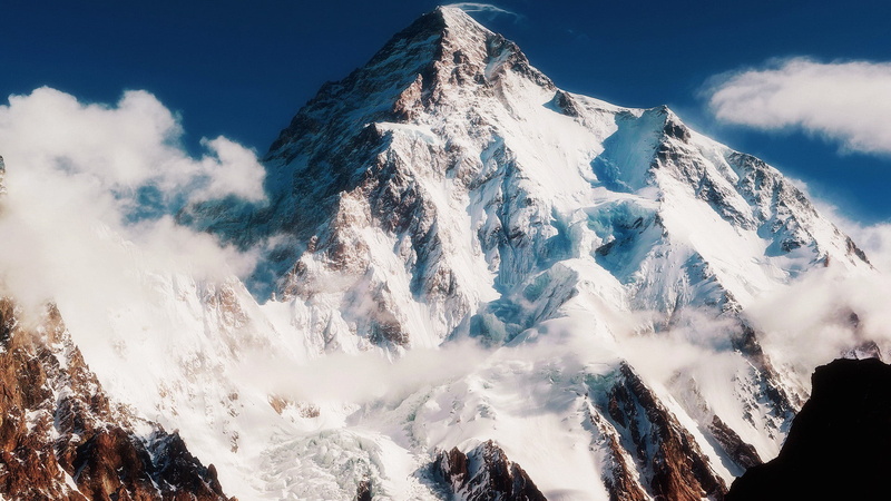 rock, glacier, tranquil scene, range, clouds, high, geological formation, outdoors, nature, sunny, snowcapped mountain, cloud - sky, extreme weather, scenics - nature