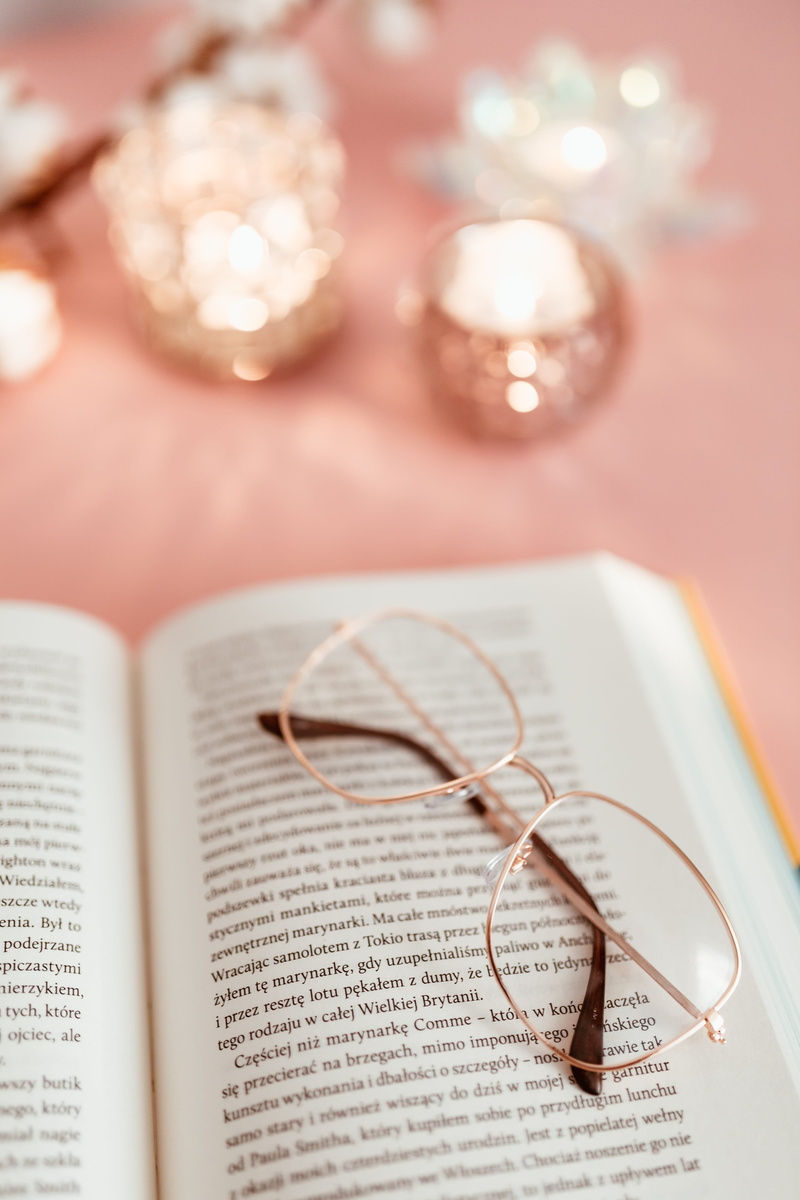 text, paper, eyeglasses, communication, learning, book, focus on foreground, still life, glasses, reading, indoors, background, western script, no people