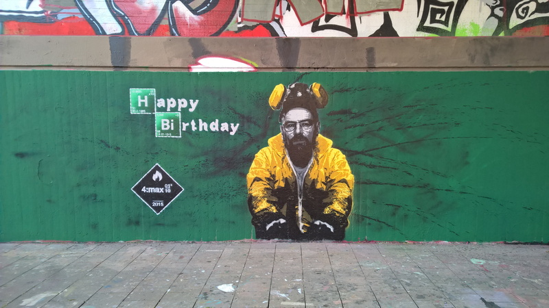 standing, graffiti, breaking bad, front view, architecture, happy, painted wall, street art, one person, outdoors, mural, colorful, leisure activity, day
