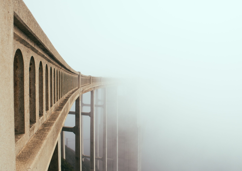 architecture, water, foggy, no people, day, building exterior, coast, nature, connection, photography, outdoors, architectural column, sky, railing, mist