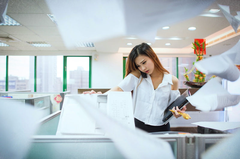 working, looking, machine, answer the phone, females, business, business Person, caucasian Ethnicity, concentration, wearing, clothing, hairstyle, young adult