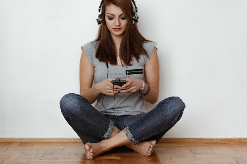music, woman, one person, teenager, song, leisure activity, wood, girl, attractive, jeans, alone, women, listening, full length, cross-legged, young women