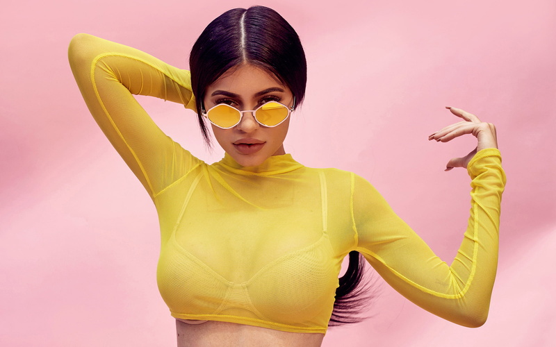 portrait, kylie, photoshoot, hair, pink color, sunglasses, indoors, waist up, young adult, human arm, yellow, jenner, winking, adult, looking at camera