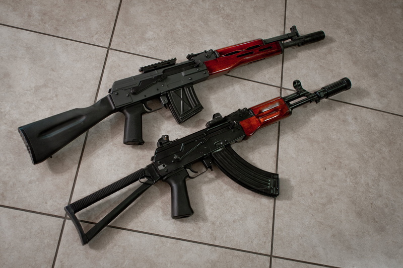 danger, law, gun, shooting A Weapon, safety, security, tiled floor, machine, single Object, target Shooting, carabiner, no People, machine gun, background