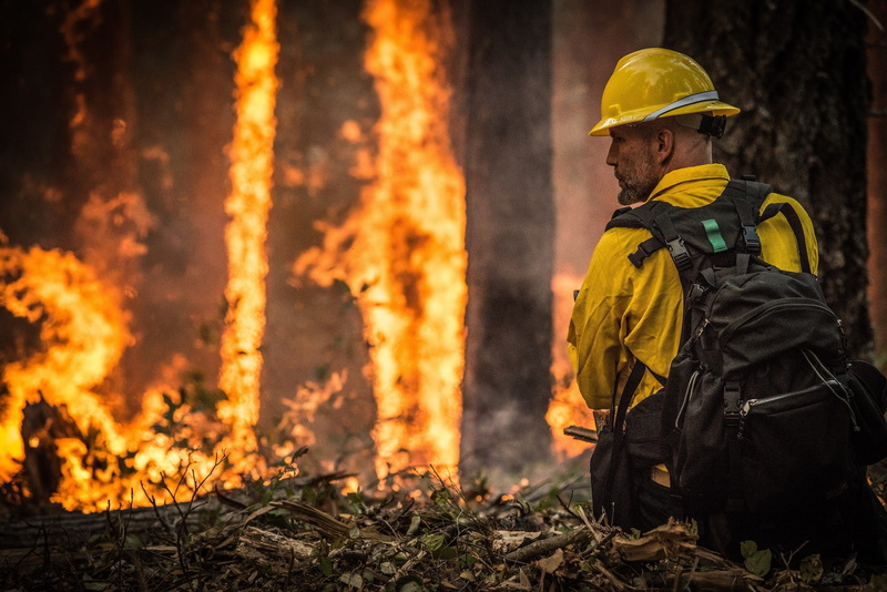 destruction, flames, big windy complex, outdoors, warning sign, fire - natural phenomenon, nature, hot, flame, clothing, sign, bonfire, occupation, heat