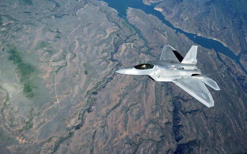 fighter plane, plane, aerial view, F-22 Raptor, motion, day, outdoors, nature, mode of transportation, on the move, flying, land, 1080P, military, landscape