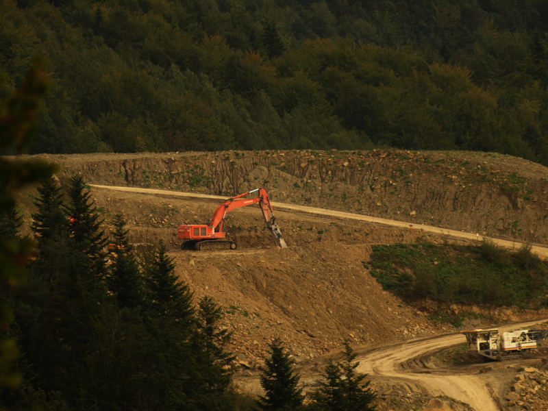 growth, high angle view, industrial landscape, extraction, tranquility, transportation, the industry, no people, landscape, outdoors, green color, an open coal mine