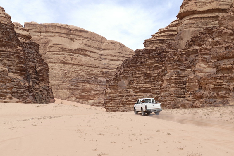arid climate, physical geography, mode of transportation, rock formation, all terrain vehicle, sand stone, jordan, travel, day, eroded, no people, rocky mountains