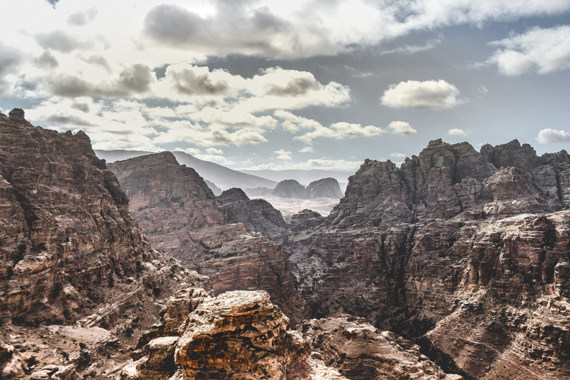 travel, beauty in nature, climate, travel destinations, wadi rum, geology, landscape, plateau, valley, mountain range, cliff, environment, wilderness, cloud - sky