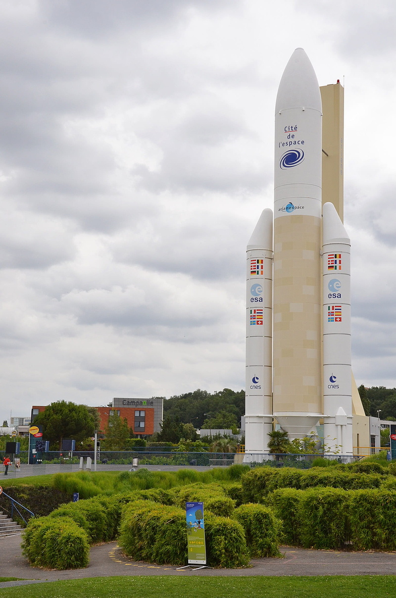 city, day, sky, green color, direction, esa, nature, park - man made space, ariane rocket, building exterior, toulouse, space, grass, building, tall - high