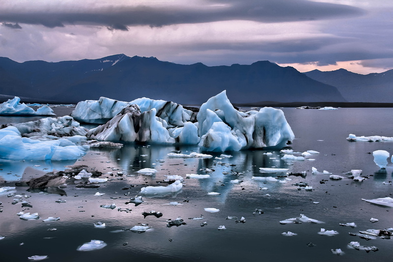 actions, distribute, cold - Temperature, clouds, nice, iceberg, colours, tones, land, wide  angle, cold  water, image, iceland, daytime, body of water