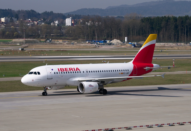 commercial airplane, airport runway, Iberia, A319, corporate jet, tree, air vehicle, luxury, airplane, tarmac, airport, aerospace industry, Airbus, nature