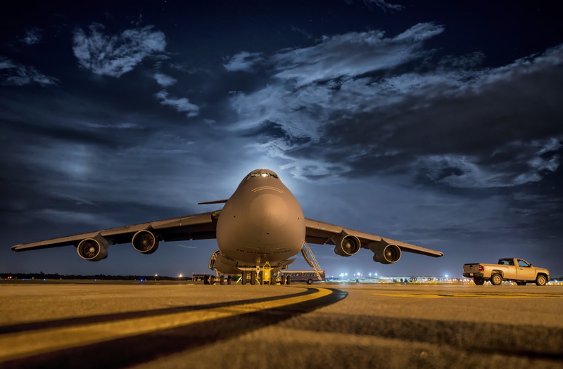 blue, aircraft, no people, silhouette, pickup, aerospace industry, sky, evening, public transportation, cargo aircraft, night, mode of transportation, boeing c-17 globemaster iii