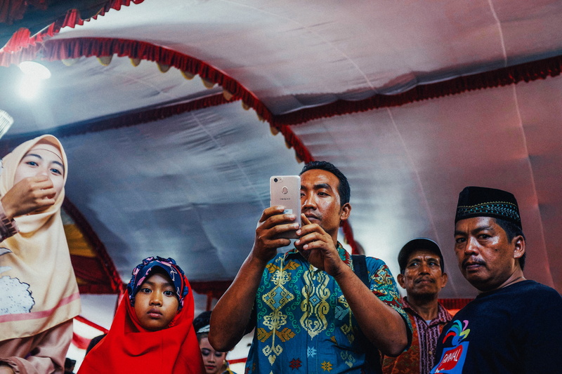 ponorogo regency, low angle view, women, leisure activity, human, real people, parade, woman, waist up, group of people, medium group of people, female