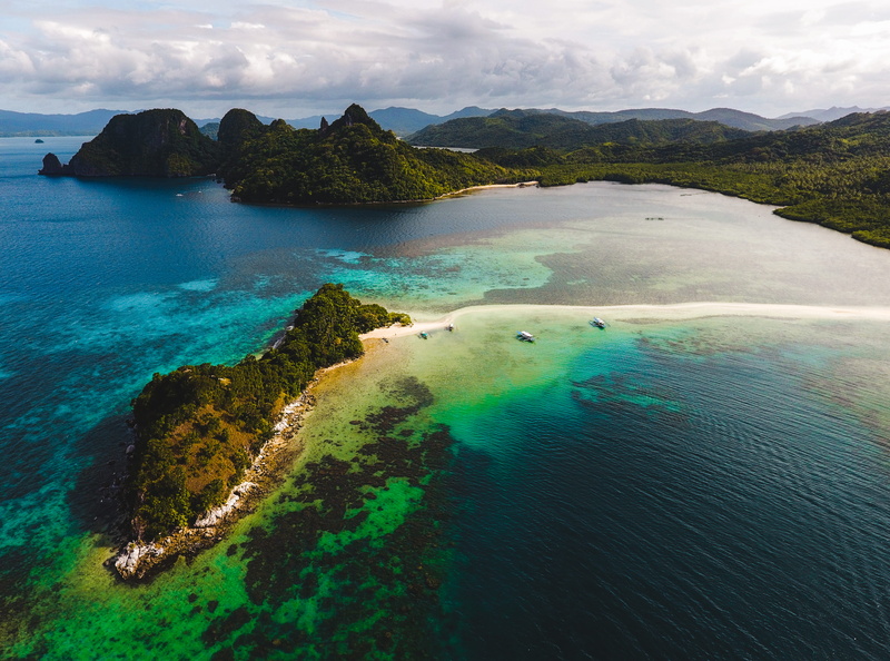 beauty in nature, aerial, tropical, exotic, tranquil scene, no people, beach, drone, mountain, non-urban scene, travel destinations, outdoors, sea, beautiful